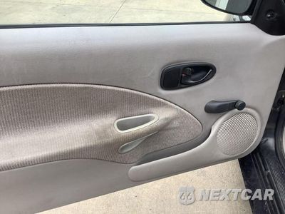Zdjęcie 21 z 24 samochodu: 1999 SATURN SC1 VIN:1G8ZP1283XZ324457 - miniatura