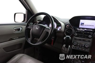 Zdjęcie 27 z 49 samochodu: 2014 HONDA PILOT EXLN VIN:5FNYF3H70EB002103 - miniatura