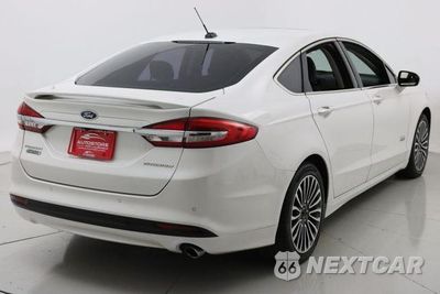 Piąte zdjęcie samochodu w środku: 2017 FORD FUSION TITANIUM PHEV VIN:3FA6P0SU6HR152176 - miniatura