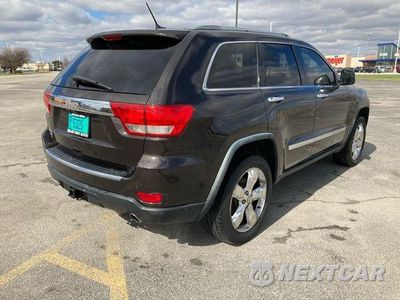Piąte zdjęcie samochodu w środku: 2011 JEEP GRAND CHEROKEE OVERLAND VIN:1J4RR6GG9BC632820 - miniatura