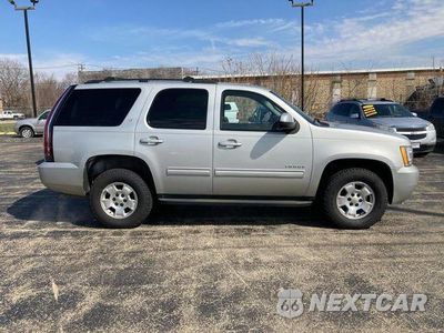 Piąte zdjęcie samochodu w środku: 2011 CHEVROLET TAHOE K1500 LT VIN:1GNSKBE03BR157762 - miniatura