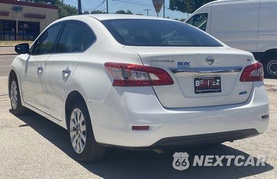 Piąte zdjęcie samochodu w środku: 2014 NISSAN SENTRA S VIN:3N1AB7APXEL665813 - miniatura