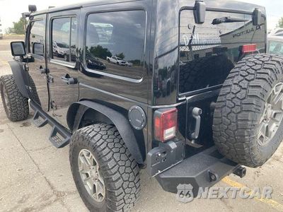 Trzecie zdjęcie samochodu z tyłu: 2013 JEEP WRANGLER UNLIMITED RUBICON VIN:1C4HJWFG6DL553750 - miniatura