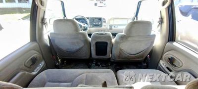 Zdjęcie 6 z 12 samochodu: 1999 GMC SUBURBAN K2500 VIN:3GKGK26R4XG505804 - miniatura