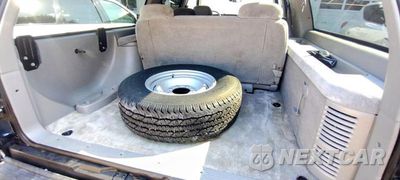 Piąte zdjęcie samochodu w środku: 1999 GMC SUBURBAN K2500 VIN:3GKGK26R4XG505804 - miniatura