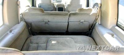 Zdjęcie 7 z 12 samochodu: 1999 GMC SUBURBAN K2500 VIN:3GKGK26R4XG505804 - miniatura