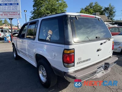 Czwarte zdjęcie samochodu z boku: 1997 FORD EXPLORER VIN:1FMDU34X8VZB22571 - miniatura