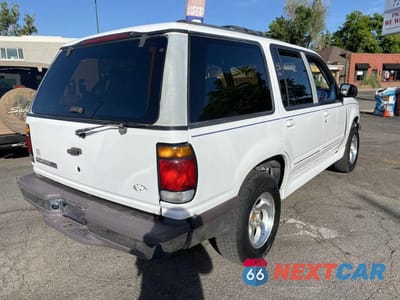 Trzecie zdjęcie samochodu z tyłu: 1997 FORD EXPLORER VIN:1FMDU34X8VZB22571 - miniatura