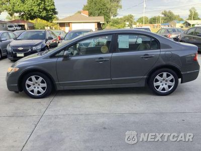 Czwarte zdjęcie samochodu z boku: 2011 HONDA CIVIC LX VIN:19XFA1F51BE034409 - miniatura