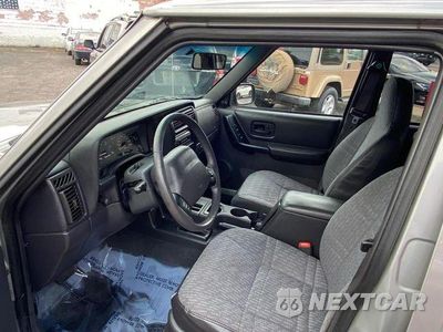 Piąte zdjęcie samochodu w środku: 2000 JEEP CHEROKEE SPORT VIN:1J4FF48S3YL210103 - miniatura