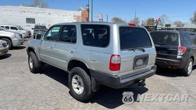 Trzecie zdjęcie samochodu z tyłu: 1999 TOYOTA 4RUNNER SR5 VIN:JT3HN86R9X0243460 - miniatura