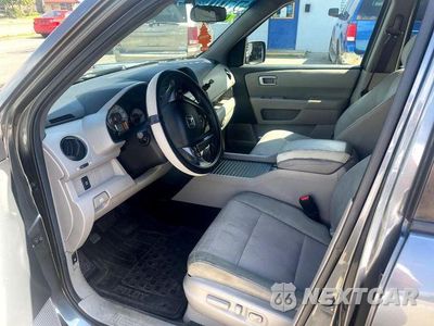 Zdjęcie 10 z 13 samochodu: 2011 HONDA PILOT EX VIN:5FNYF3H40BB055370 - miniatura