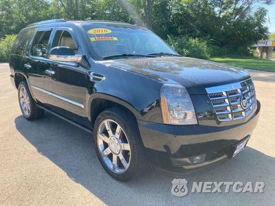Czwarte zdjęcie samochodu z boku: 2010 CADILLAC ESCALADE PREMIUM VIN:1GYUKCEF3AR135250 - miniatura