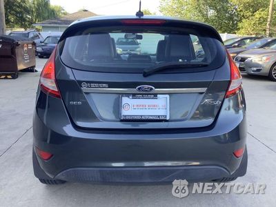 Zdjęcie 6 z 56 samochodu: 2011 FORD FIESTA SES VIN:3FADP4FJ8BM124821 - miniatura