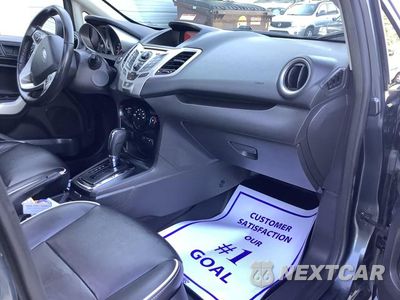 Zdjęcie 32 z 56 samochodu: 2011 FORD FIESTA SES VIN:3FADP4FJ8BM124821 - miniatura
