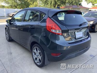 Piąte zdjęcie samochodu w środku: 2011 FORD FIESTA SES VIN:3FADP4FJ8BM124821 - miniatura