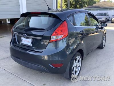 Zdjęcie 7 z 56 samochodu: 2011 FORD FIESTA SES VIN:3FADP4FJ8BM124821 - miniatura