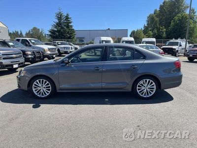 Czwarte zdjęcie samochodu z boku: 2011 VOLKSWAGEN JETTA SEL VIN:3VWLX7AJ8BM351602 - miniatura