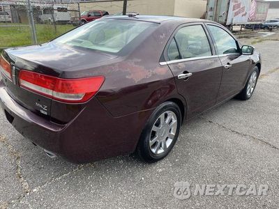 Zdjęcie 6 z 15 samochodu: 2011 LINCOLN MKZ VIN:3LNHL2JC2BR766969 - miniatura