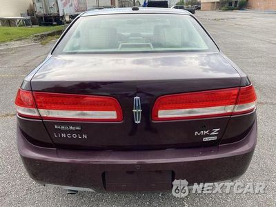 Piąte zdjęcie samochodu w środku: 2011 LINCOLN MKZ VIN:3LNHL2JC2BR766969 - miniatura