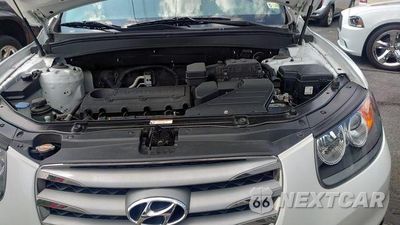 Zdjęcie 7 z 17 samochodu: 2012 HYUNDAI SANTA FE GLS VIN:5XYZG3AB3CG102217 - miniatura