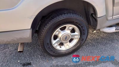 Zdjęcie 6 z 13 samochodu: 2001 FORD EXPLORER SPORT TRAC VIN:1FMZU77E21UC75056 - miniatura