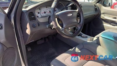 Zdjęcie 8 z 13 samochodu: 2001 FORD EXPLORER SPORT TRAC VIN:1FMZU77E21UC75056 - miniatura