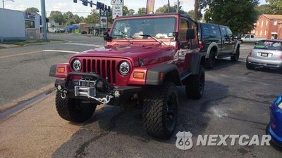 Drugie zdjęcie samochodu z przodu: 1999 JEEP WRANGLER / TJ SPORT VIN:1J4FY19S4XP474929 - miniatura