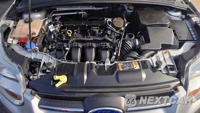 Zdjęcie 14 z 14 samochodu: 2014 FORD FOCUS SE VIN:1FADP3K24EL360512 - miniatura