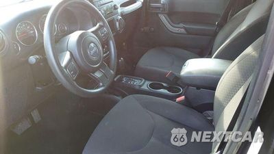 Piąte zdjęcie samochodu w środku: 2016 JEEP WRANGLER UNLIMITED SPORT VIN:1C4BJWDG2GL177500 - miniatura