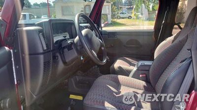 Zdjęcie 7 z 13 samochodu: 1999 JEEP WRANGLER / TJ SPORT VIN:1J4FY19S4XP474929 - miniatura