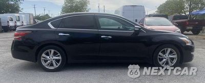 Czwarte zdjęcie samochodu z boku: 2015 NISSAN ALTIMA 2.5 VIN:1N4AL3AP0FN922004 - miniatura