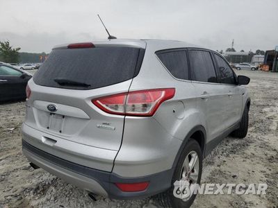 Czwarte zdjęcie samochodu z boku: 2016 FORD ESCAPE SE VIN:1FMCU0G97GUA31881 - miniatura
