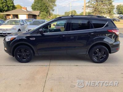 Czwarte zdjęcie samochodu z boku: 2014 FORD ESCAPE SE VIN:1FMCU9G95EUA68462 - miniatura