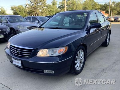 Trzecie zdjęcie samochodu z tyłu: 2006 HYUNDAI AZERA SE VIN:KMHFC46F36A102766 - miniatura