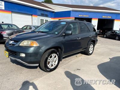 Zdjęcie 16 z 18 samochodu: 2006 ACURA MDX TOURING VIN:2HNYD18926H522966 - miniatura