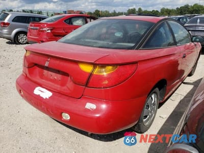 Czwarte zdjęcie samochodu z boku: 2002 SATURN SC1 VIN:1G8ZP12832Z103580 - miniatura