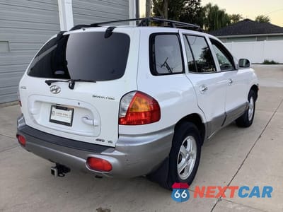 Zdjęcie 7 z 27 samochodu: 2002 HYUNDAI SANTA FE GLS VIN:KM8SC73D12U150049 - miniatura