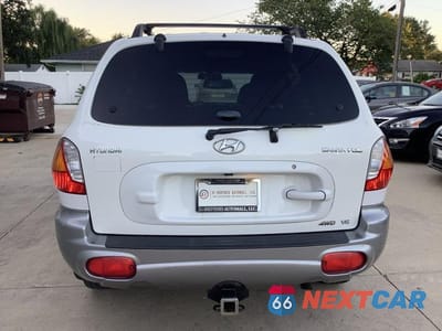 Zdjęcie 6 z 27 samochodu: 2002 HYUNDAI SANTA FE GLS VIN:KM8SC73D12U150049 - miniatura