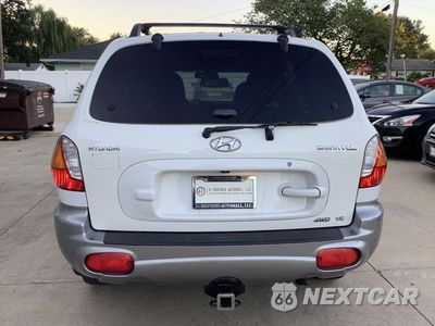 Zdjęcie 6 z 27 samochodu: 2002 HYUNDAI SANTA FE GLS VIN:KM8SC73D12U150049 - miniatura