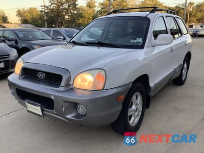 Trzecie zdjęcie samochodu z tyłu: 2002 HYUNDAI SANTA FE GLS VIN:KM8SC73D12U150049 - miniatura