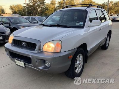 Trzecie zdjęcie samochodu z tyłu: 2002 HYUNDAI SANTA FE GLS VIN:KM8SC73D12U150049 - miniatura