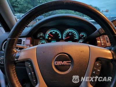 Zdjęcie 32 z 34 samochodu: 2008 GMC YUKON HYBRID VIN:1GKFC13528R210741 - miniatura