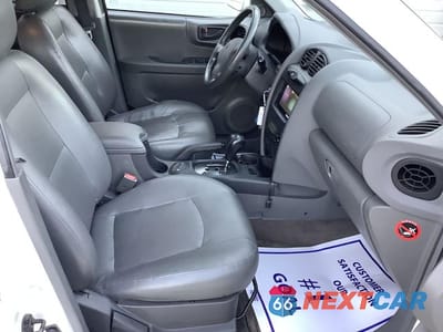 Zdjęcie 19 z 27 samochodu: 2002 HYUNDAI SANTA FE GLS VIN:KM8SC73D12U150049 - miniatura