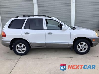 Zdjęcie 8 z 27 samochodu: 2002 HYUNDAI SANTA FE GLS VIN:KM8SC73D12U150049 - miniatura