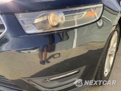 Zdjęcie 12 z 22 samochodu: 2014 FORD TAURUS SEL VIN:1FAHP2E86EG133729 - miniatura