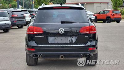 Czwarte zdjęcie samochodu z boku: 2011 VOLKSWAGEN TOUAREG V6 TDI VIN:WVGFK9BP6BD005858 - miniatura
