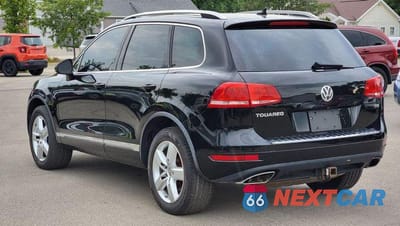 Piąte zdjęcie samochodu w środku: 2011 VOLKSWAGEN TOUAREG V6 TDI VIN:WVGFK9BP6BD005858 - miniatura