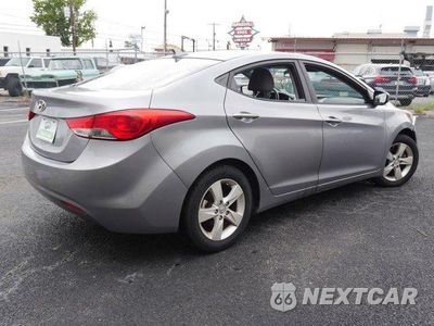 Piąte zdjęcie samochodu w środku: 2013 HYUNDAI ELANTRA GLS VIN:KMHDH4AE9DU721598 - miniatura