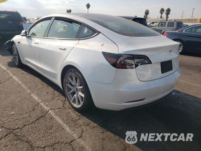 Trzecie zdjęcie samochodu z tyłu: 2021 TESLA MODEL 3 VIN:5YJ3E1EA1MF940403 - miniatura